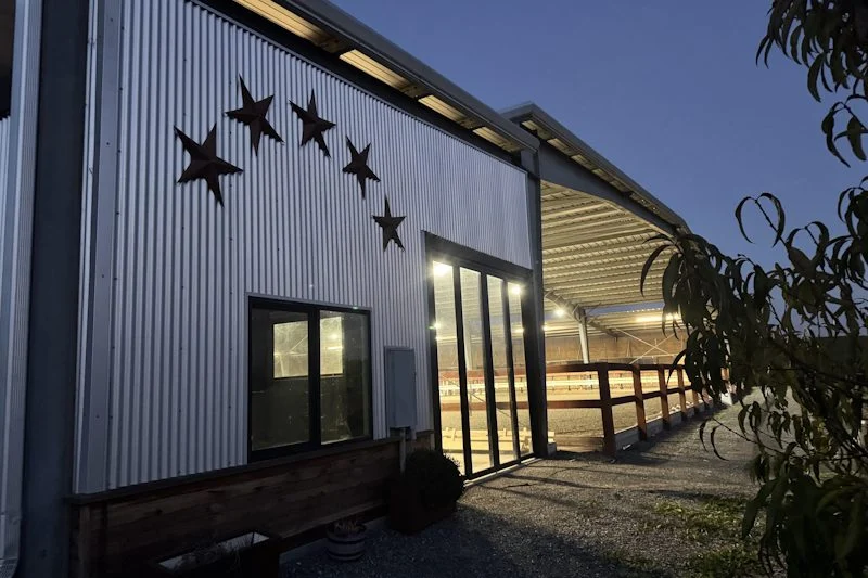 Covered arena entrance at dusk